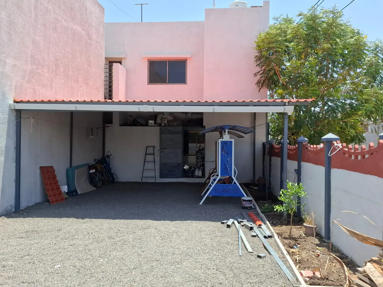 Gurukrupa residential parking canopy roofing project